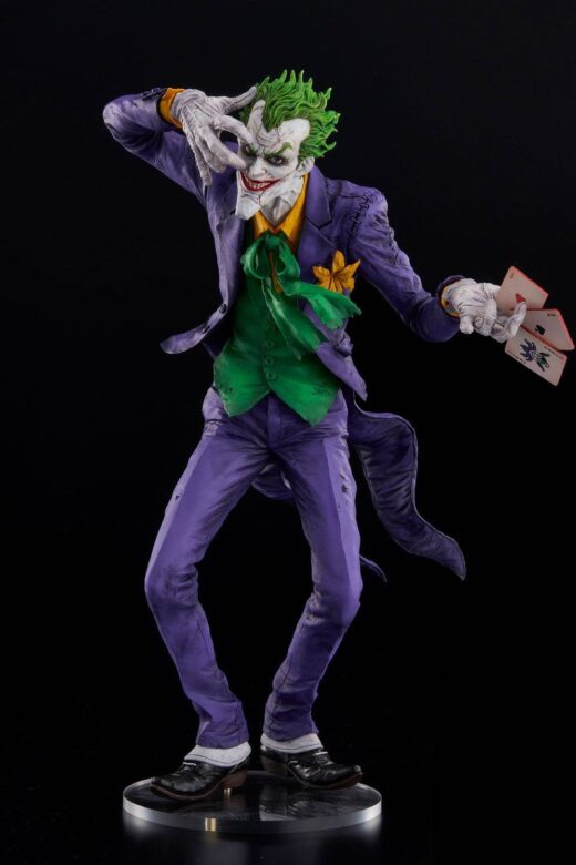 Descubre el apasionante mundo de Estatua The Joker Laughing Purple Version.